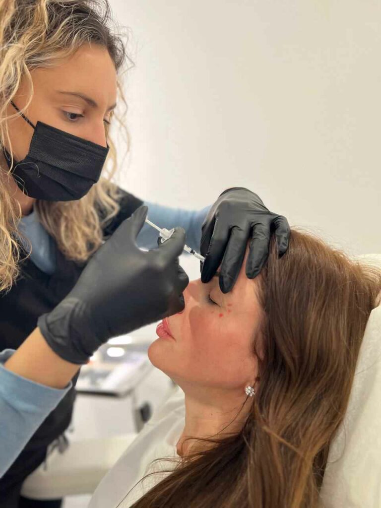 Pretty Woman Receiving Botox Injection on her Forehead | Aspen Prime MedSpa in Hoboken, NJ