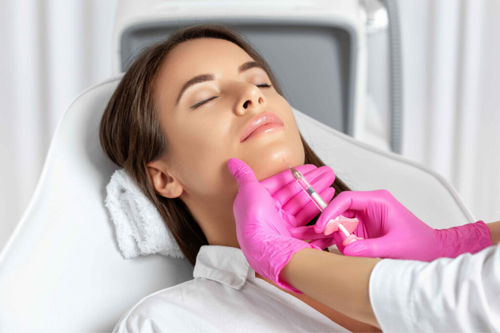 A Female getting injection on chin | Chin Augmentation | Aspen Prime Med Spa in Hoboken, NJ