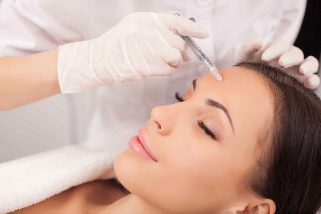 Young Attractive Female Receiving Cosmetic Injection on her Forehead | Aspen Prime MedSpa in Hoboken, NJ