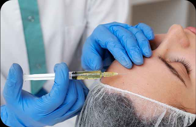 A Woman getting injection on her forehead | Vampire Facial | Aspen Prime Med Spa in Hoboken, NJ