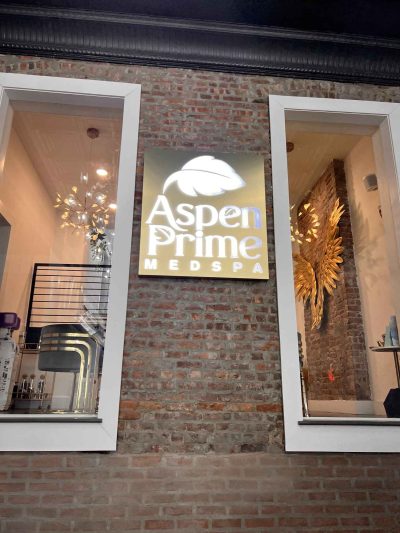 Aspen Prime MedSpa Logo Plate Beside Windows | Hoboken, NJ